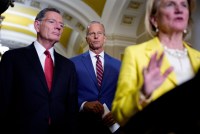 A photo of Senators John Thune, John Barrasso and Shelley Capito in the US Capitol.