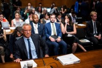 A photo of Robert F. Kennedy Jr. seated in a Senate hearing room.