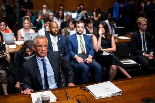 A photo of Robert F. Kennedy Jr. seated in a Senate hearing room.